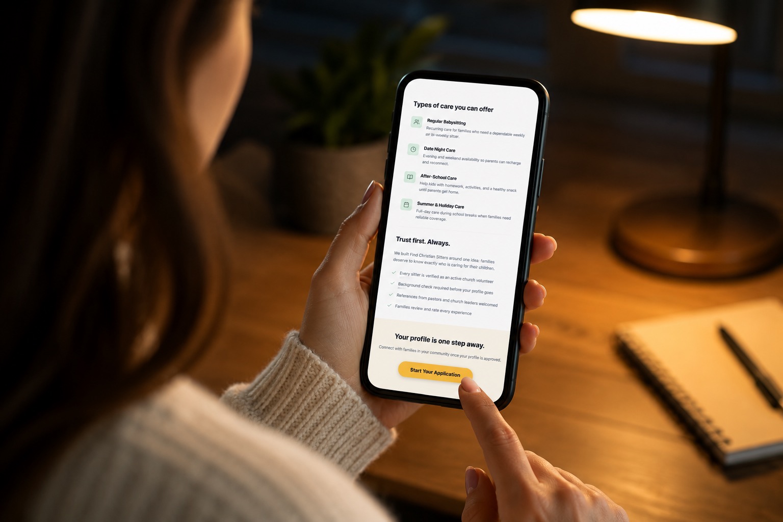 Find Christian Sitters website shown on an iPhone